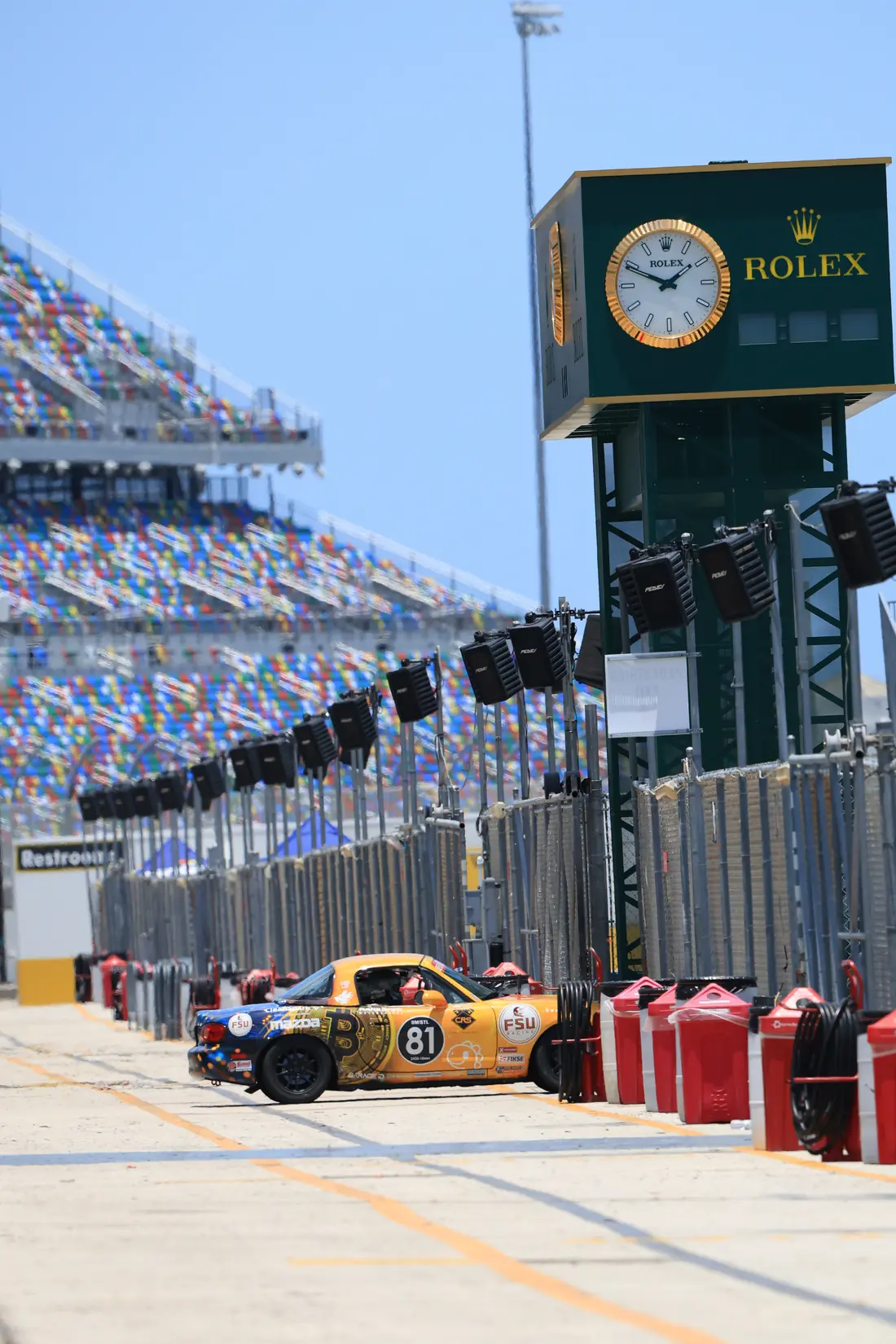 TOSHI 81 in pit lane under the Rolex clock, Daytona International Speedway